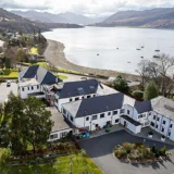Royal Hotel in Ullapool. Aerial view of the hotel with views over Loch Broom. It is also a bar, pub and restaurant. Highlands of Scotland