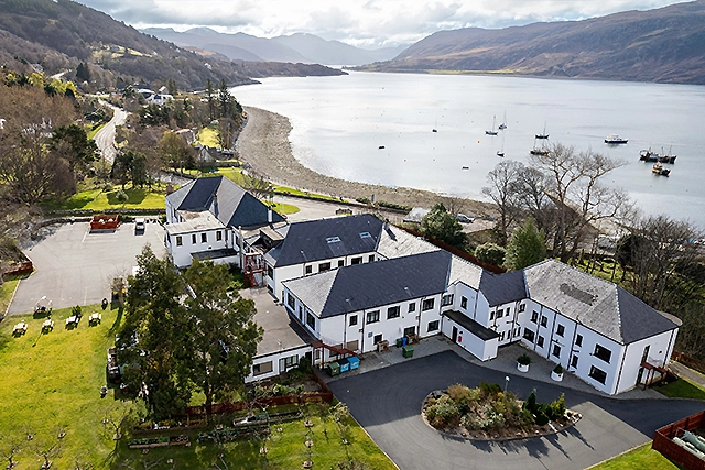 Royal Hotel in Ullapool. Aerial view of the hotel with views over Loch Broom. It is also a bar, pub and restaurant. Highlands of Scotland
